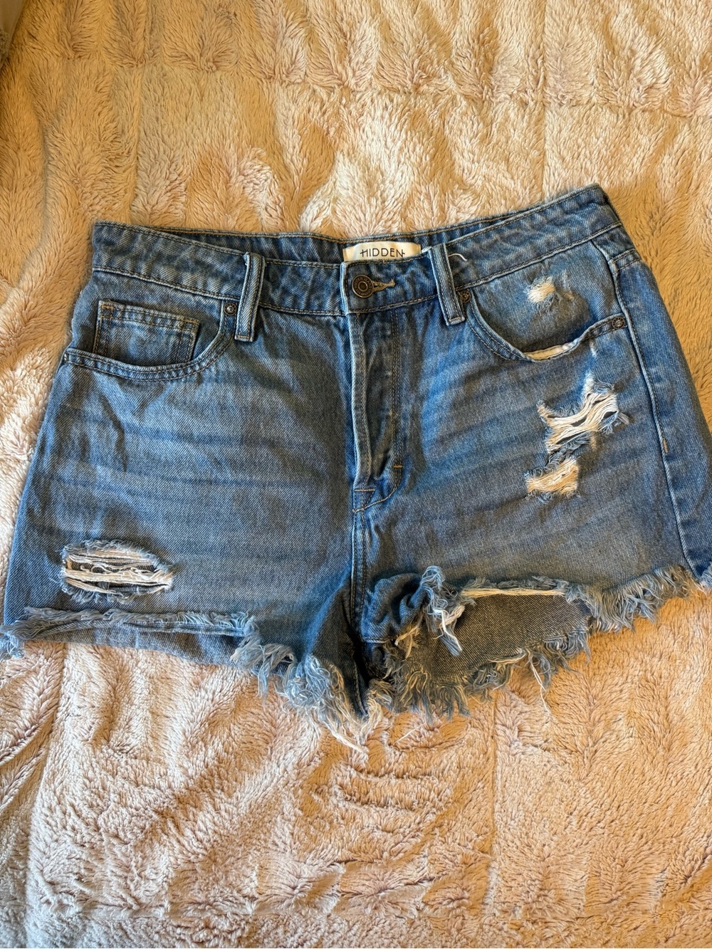Hidden high rise distressed denim shorts